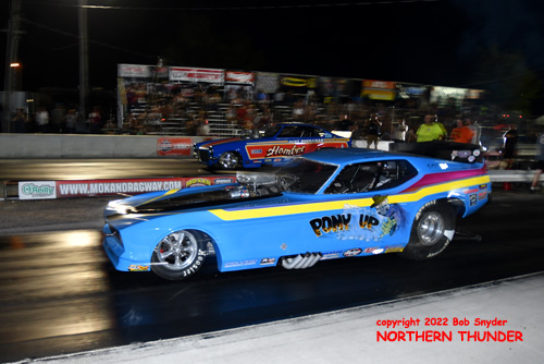 Danny Mann - 'Pony Up' (near lane) vs 
Mike Buchanan - 'Hombre' (far lane)